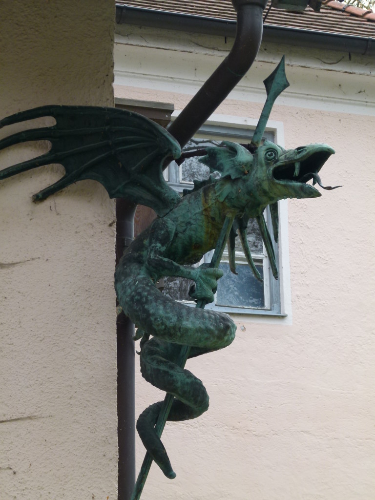 Dragon on the side of the building.