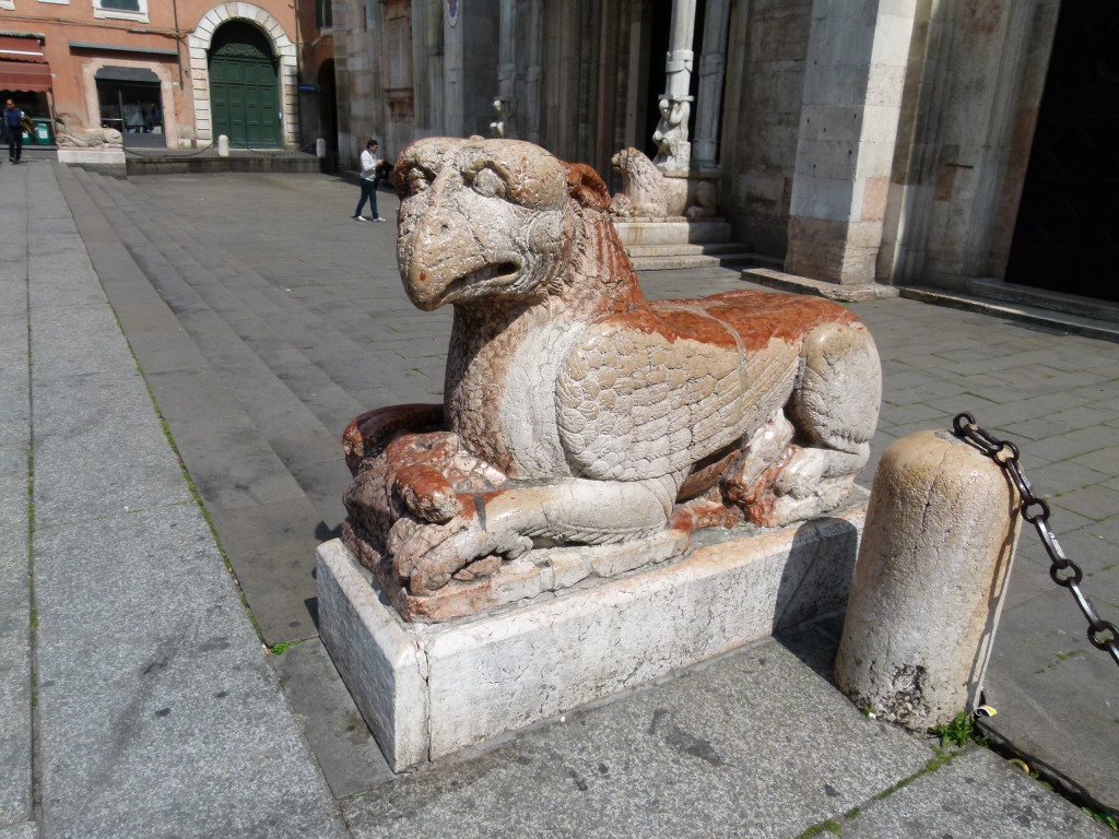 We saw a few of these creatures in front of several churches. What are they??