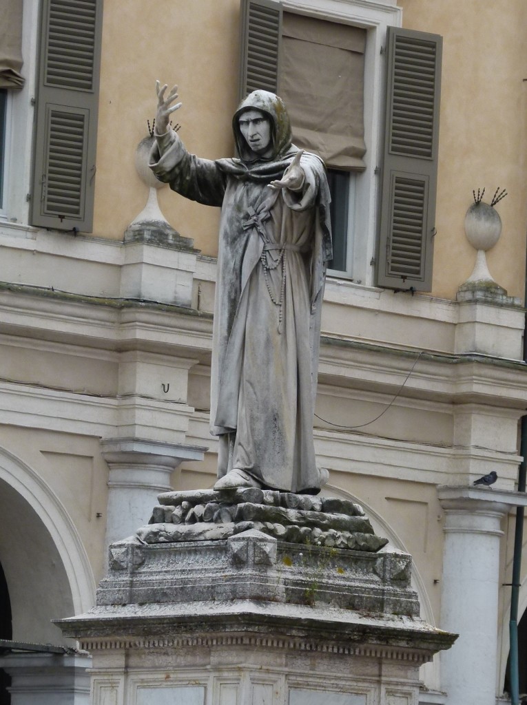 Spooky statue in a town square.