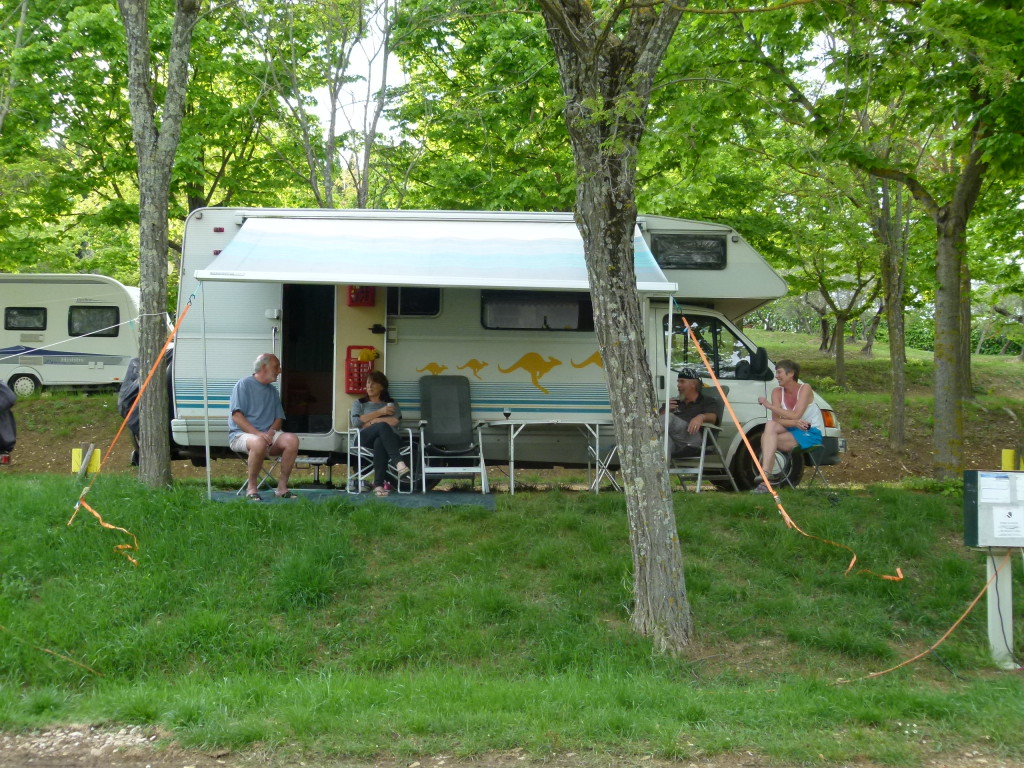 Clyde and Anna with Lori and Ewout sitting in from of the motorhome