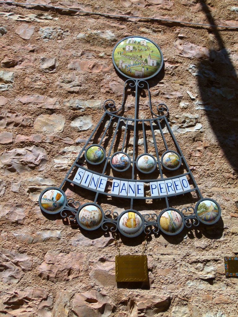 Wall ornament on a backstreet in Spello.