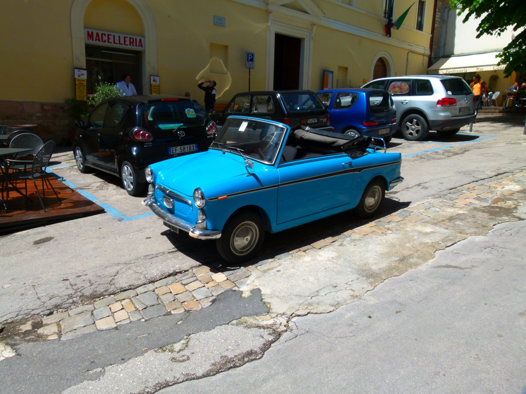 Sportscar in the town square,