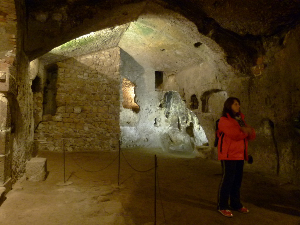 In the underground cave below the town. 