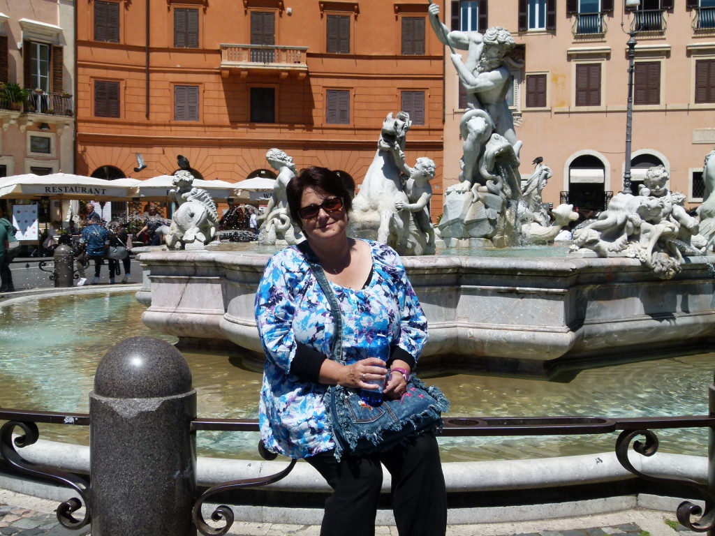 Jenny on a fountain in the Piazza Novona.