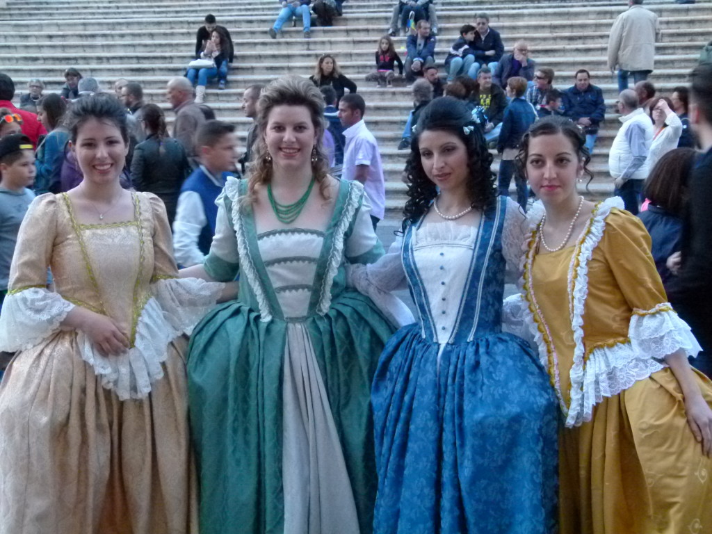 Ladies posing in their costumes.