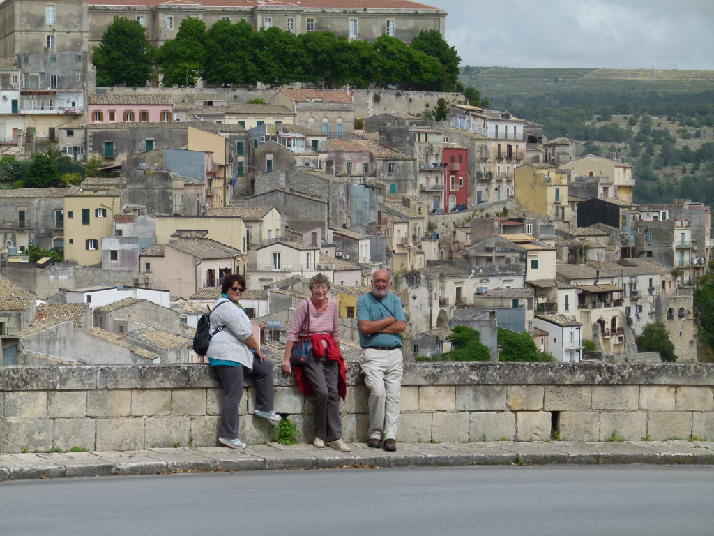 Jenny, Anna and Clyde with a view of the town behind.