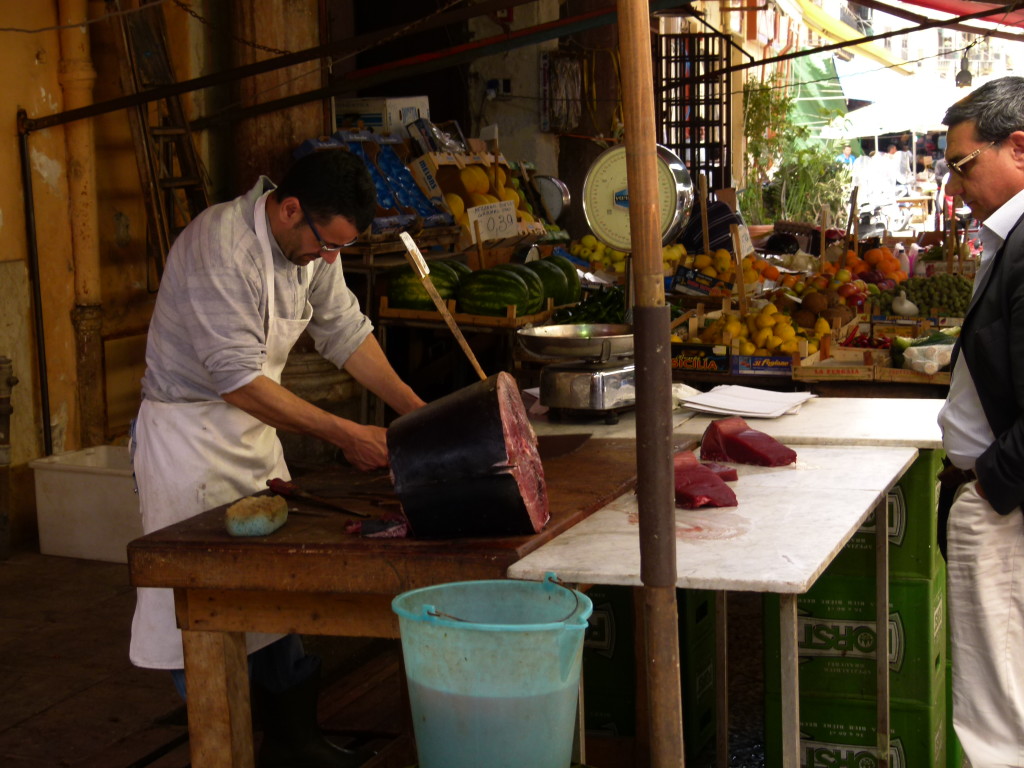 Fish market, he was cutting up some tuna.