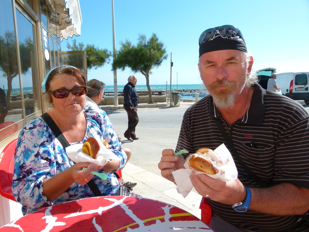 Here we are eating our gelati in a sweet bread roll. Jenny with her look of "not another photo of us eating" !!