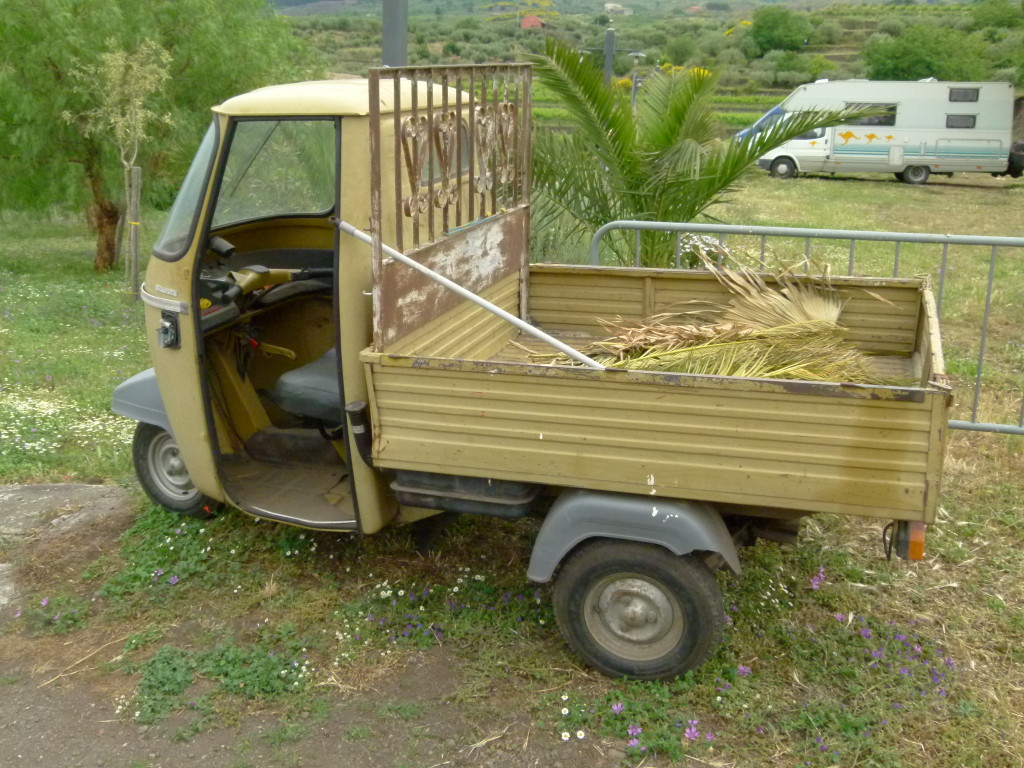 On the farm where we stayed near Mt. Etna. Missing a door but does have some nice wrought iron work behind the cab.