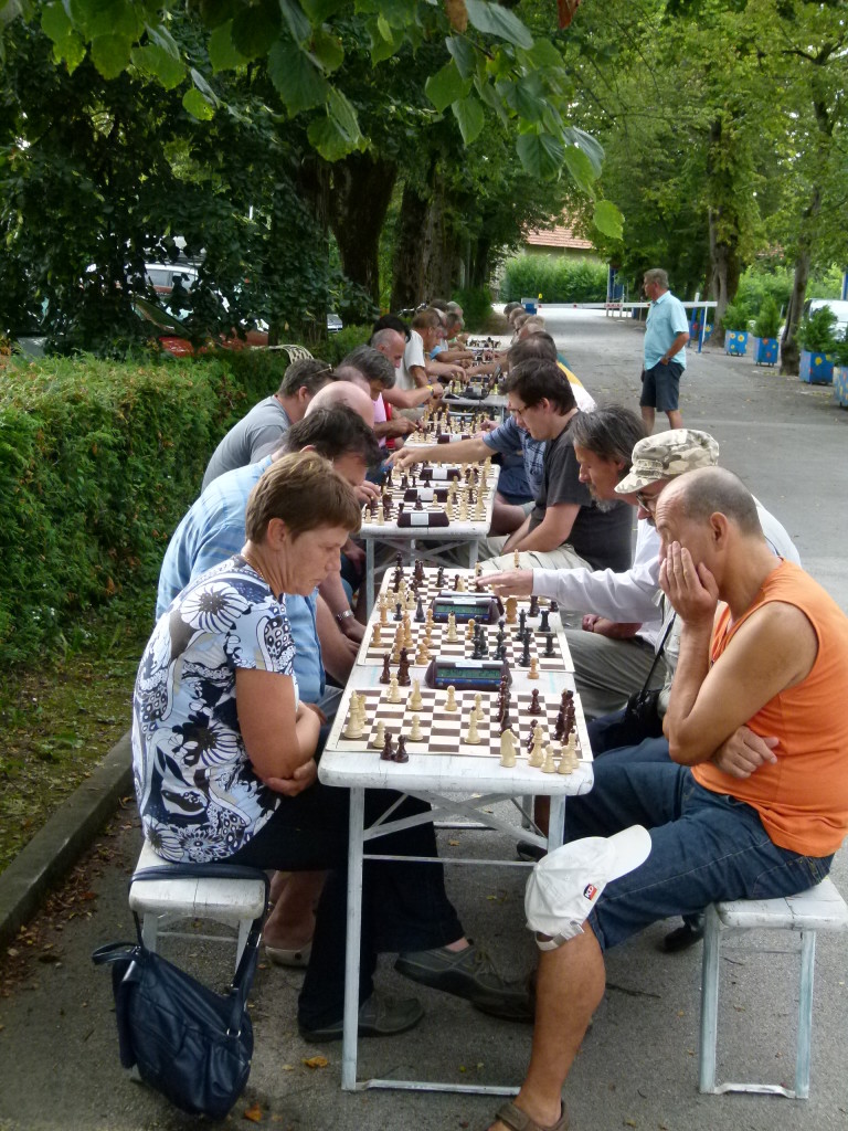 Chess night at the campsite. All went well until the rain came.