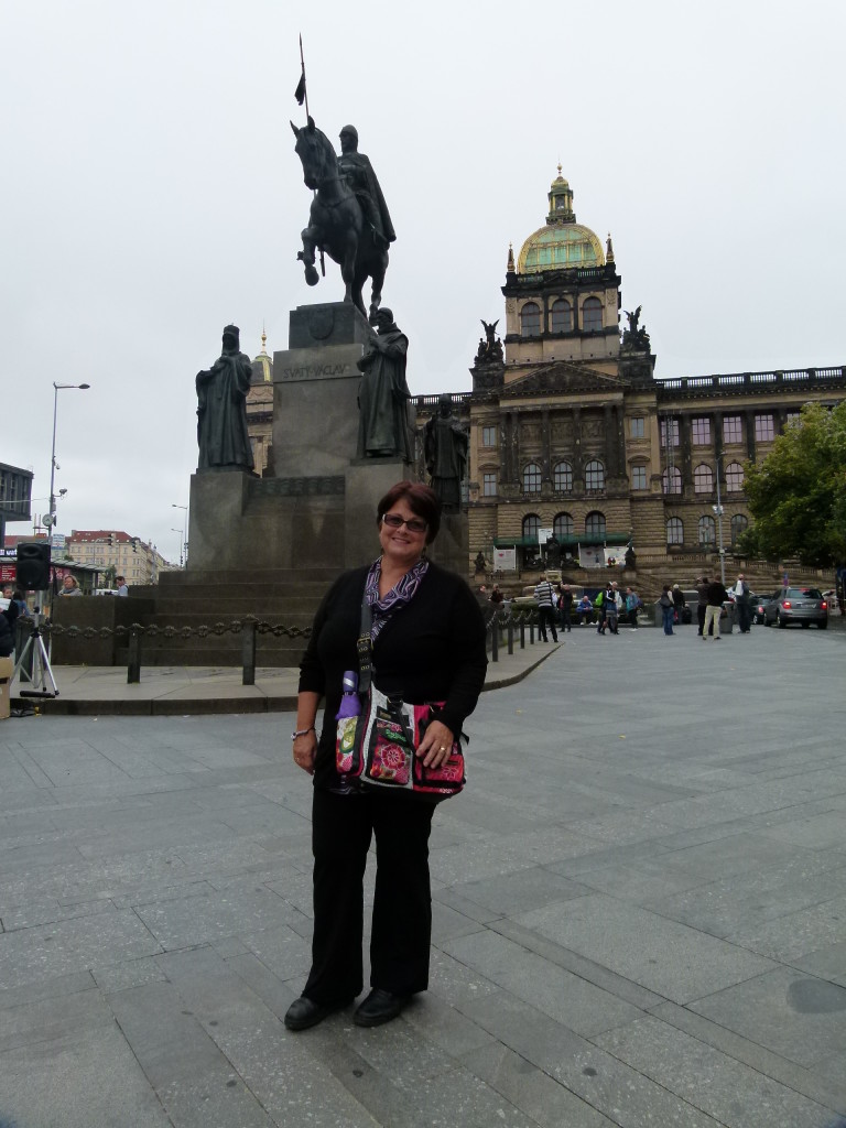 Jenny in Wenceslas square in front of another statue of King Wenceslas