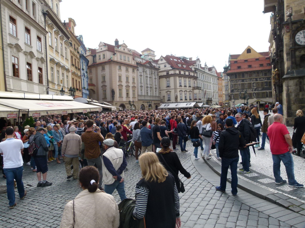 The crowds waiting for the Astronomical clock to signal the hour