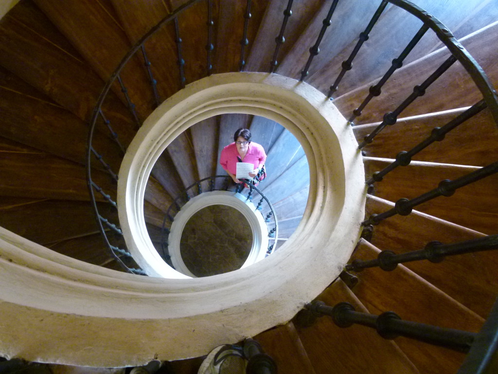 In this church you could walk up to he second floor and through the ceiling. Jenny on her way down.