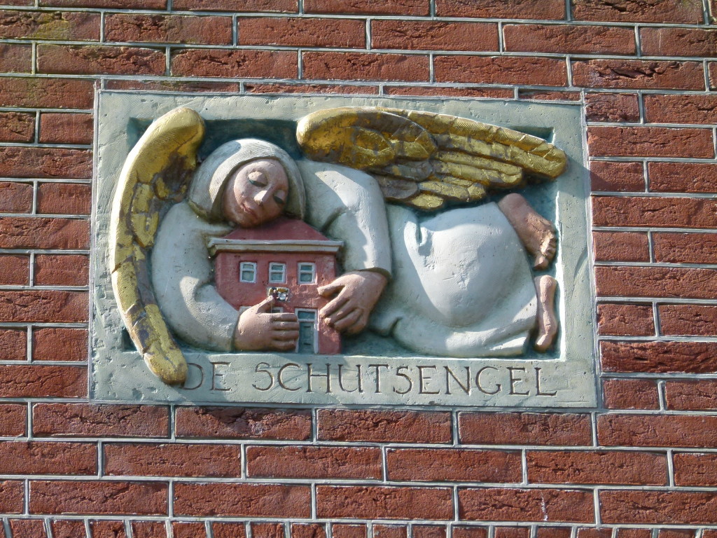 On many of the houses and businesses they had wall plaques.