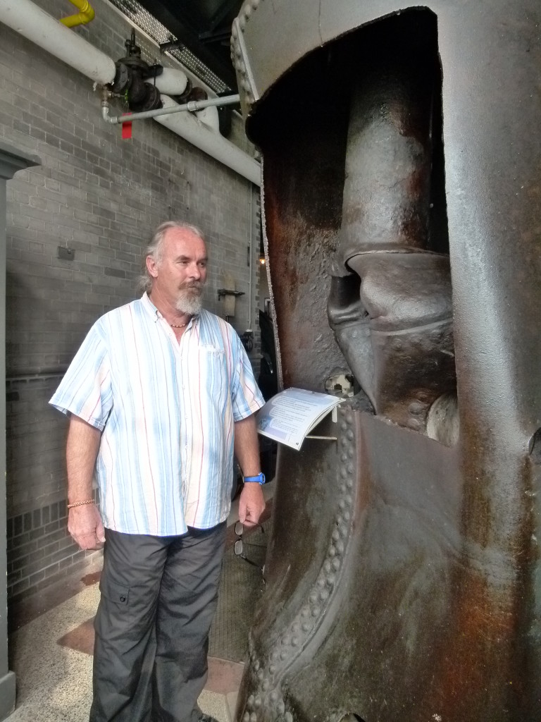 Ewout standing next to boiler that exploded in 1924 in Amsterdam. It traveled 300 meters and was buried 3 meters in the ground when it landed.