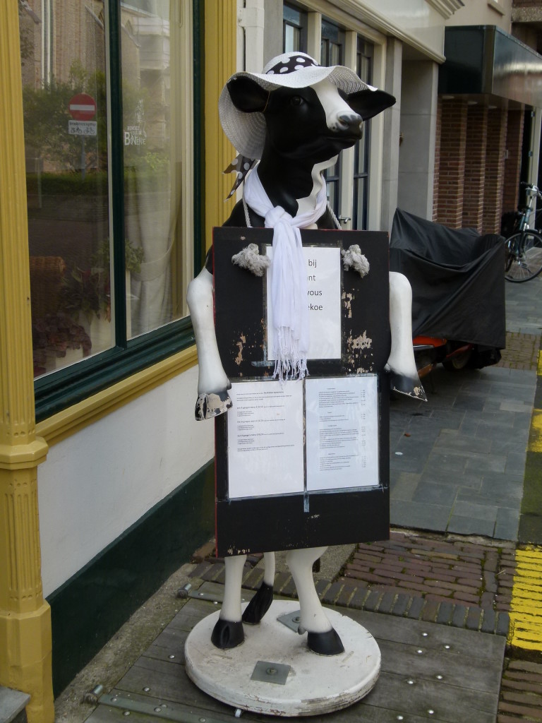 In another blog we had a photo of another cow selling off his friends. This cow is advertizing her fellow cows to be eaten. Strange!!