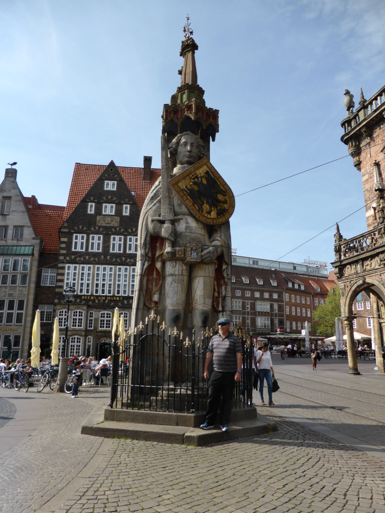 Ewout with the statue of Roland in the town Square, Bremen.