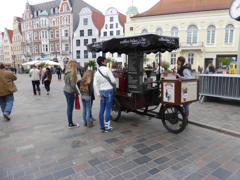 A mobile coffee vender in the main square.