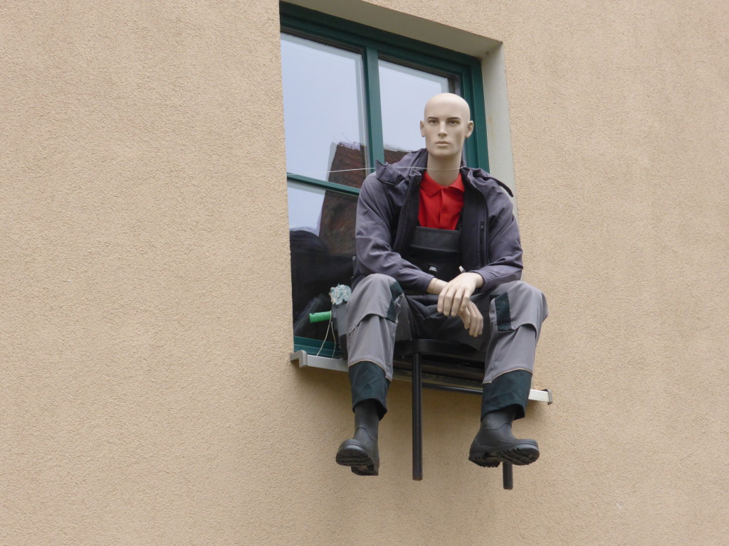 A we were walking back we saw a man sitting on the window ledge, on closer inspection he was a dummy. 