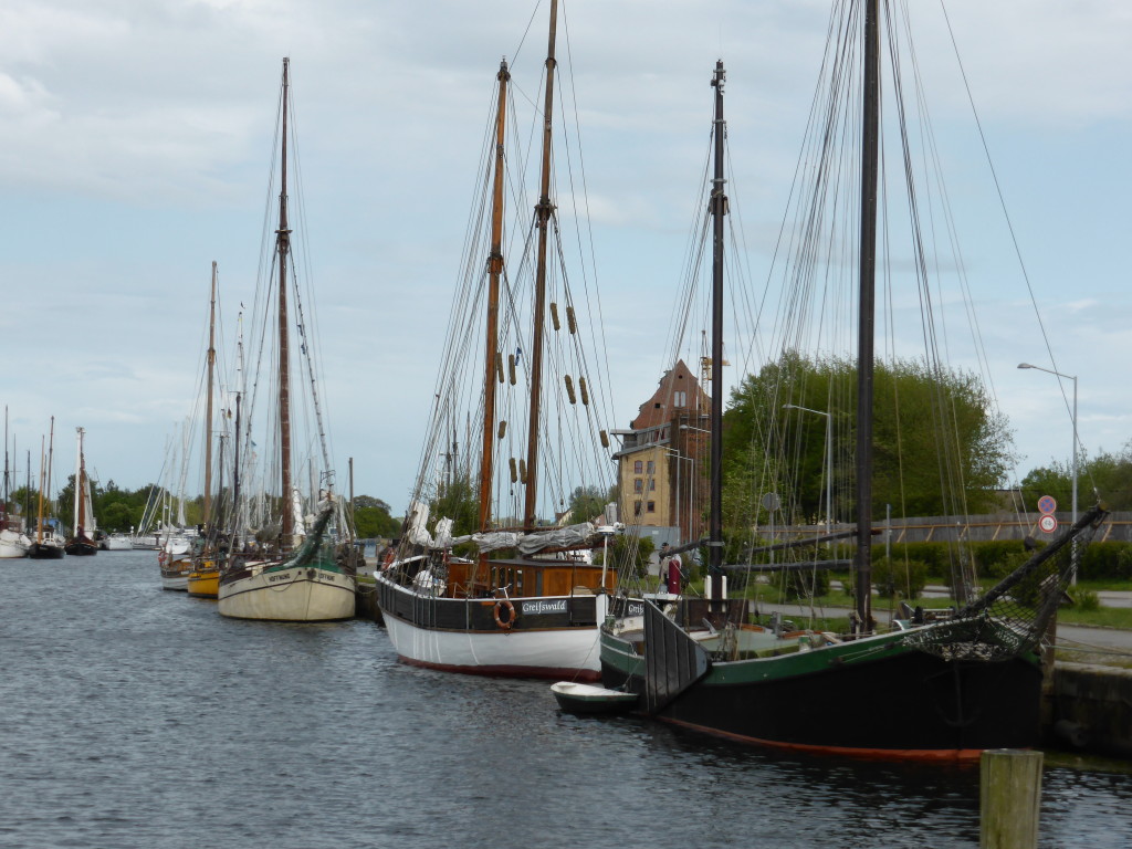 From the carpark to the old town we crossed a bridge over the water with many old boats.