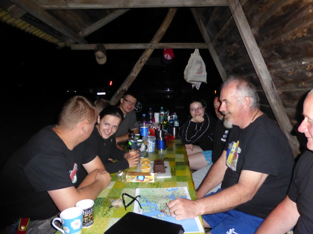 Ewout with his new T-shirt sharing the evening with the Polish people at the campsite.