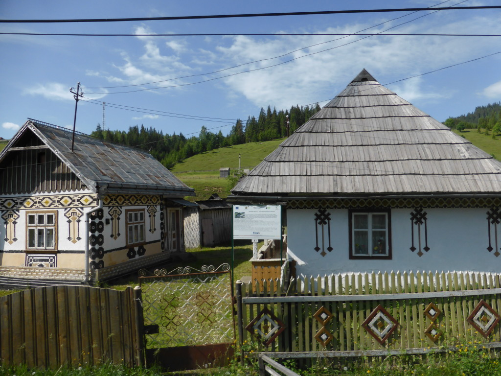 Although the road was rather bad the scenery was great. Here are a couple of houses that have been decorated.