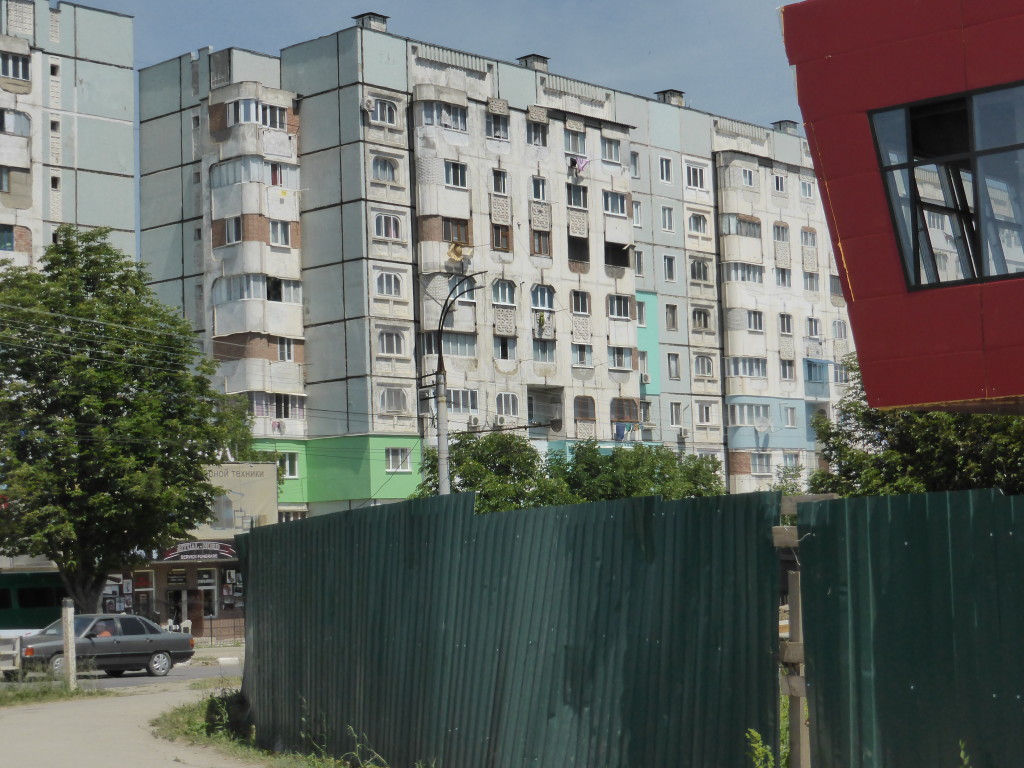 Not all the sights we see are beautiful. This is a block of flats on the outskirts of Balti. We drove through the town, not the prettiest of places.