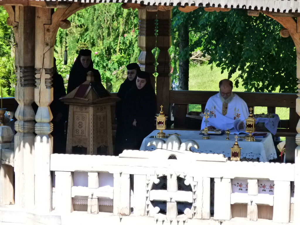 In the middle podium the nuns were chanting and singing.