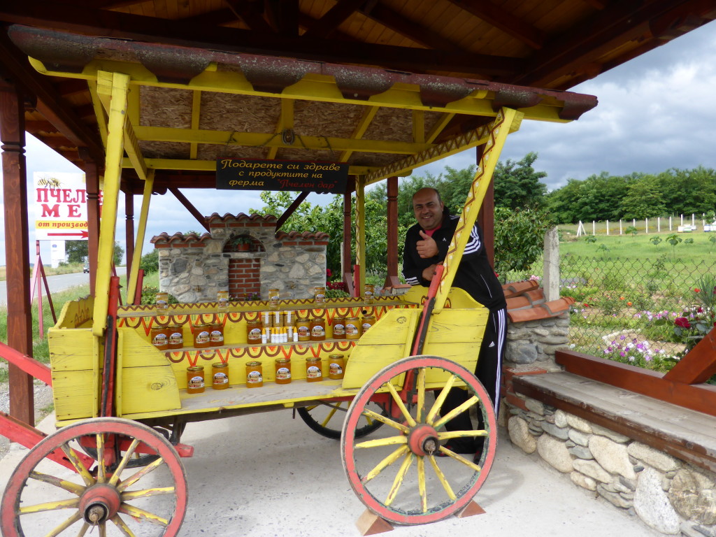 Our honey man on the side of the road. Although he didn't speak English he indicated that he didn't like the snakes in Australia. We pointed to the picture of the bear on the honey jar. They were ok he said.