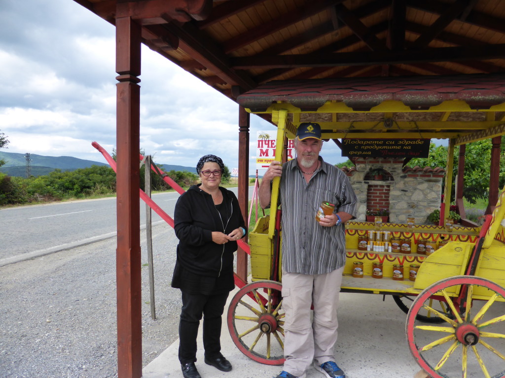 Buying honey. We took his photo so he then took ours.