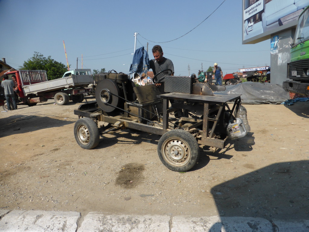 This is a mobile wood cutting saw. There were several on the road as we entered Pec.