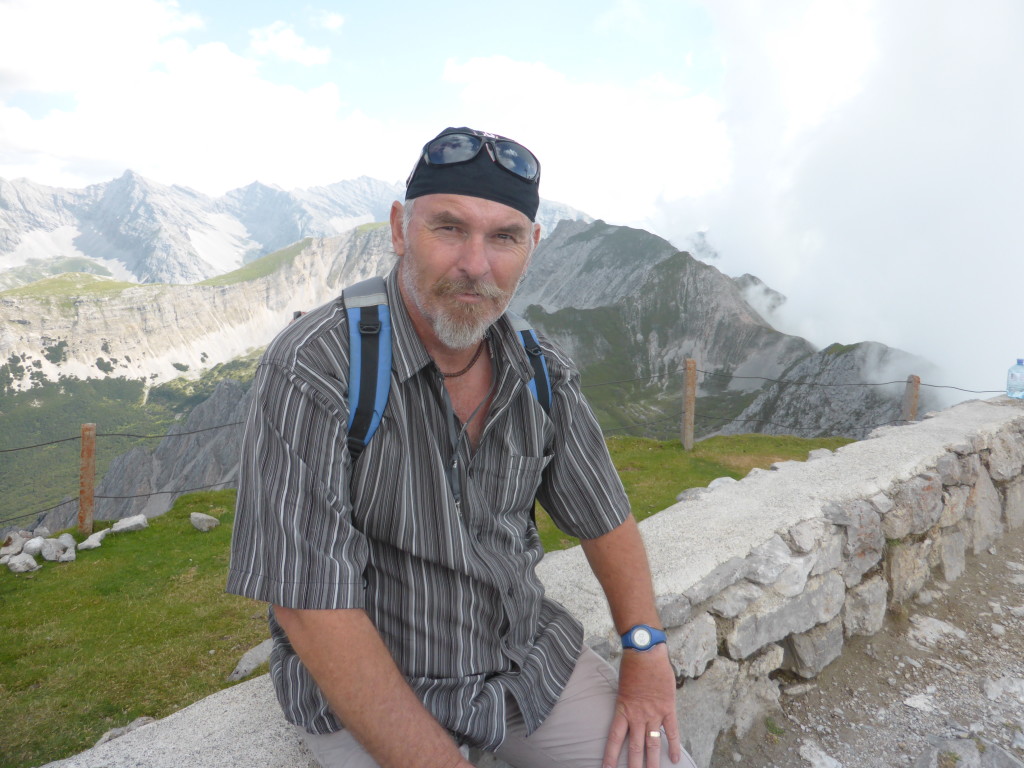 Ewout at the summit waiting for the clouds to clear. 