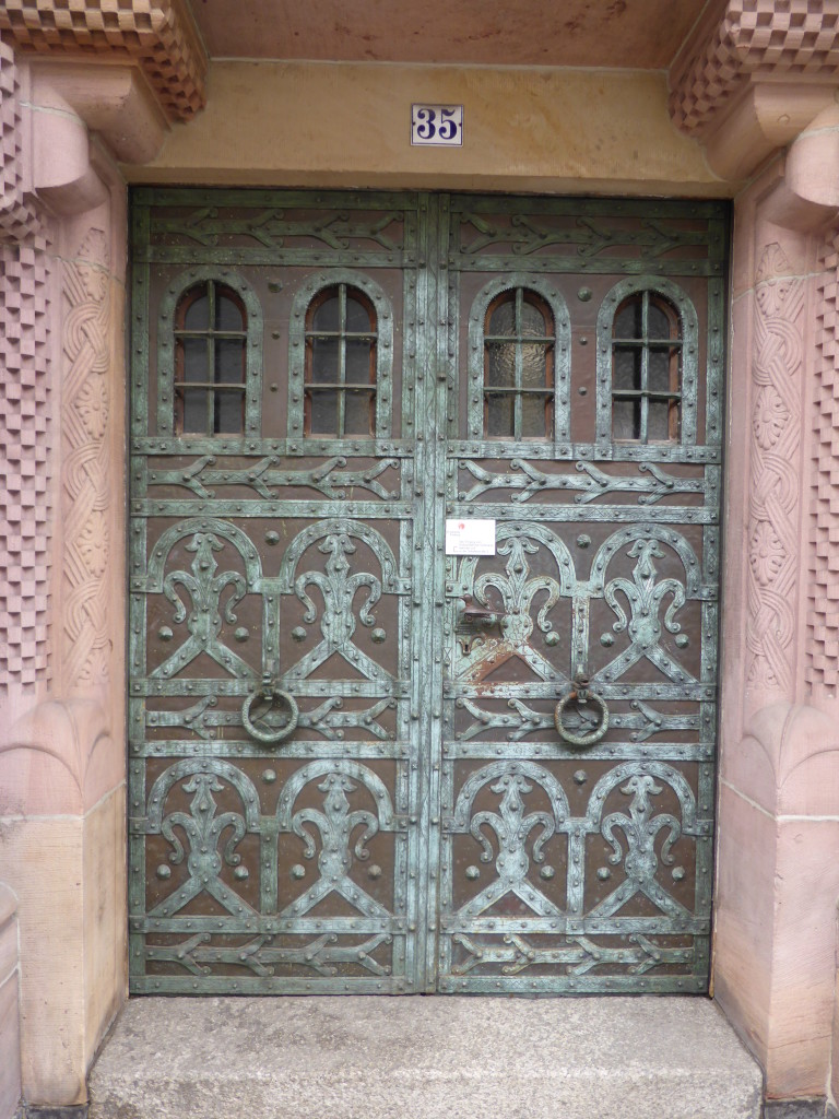 Door photo for the blog. Quiet elaborate metal work.